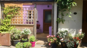 Cute self-contained guest room with ensuite and private decked porch in Glastonbury